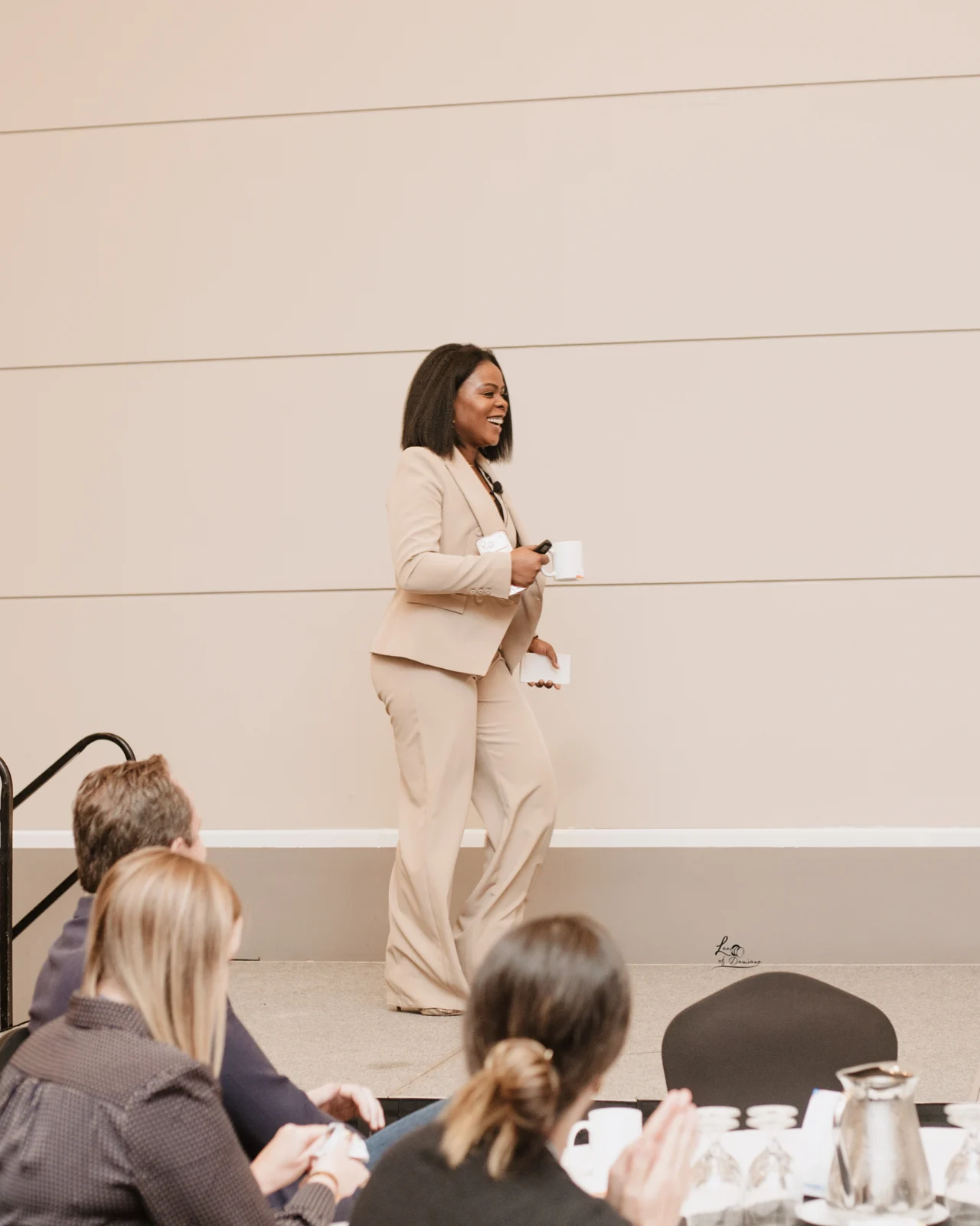 Ola Fasuba speaking at a professional conference